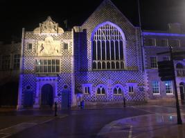 The Town Hall and Corn Exchange lit up in purple to celebrate World Polio Day on 24 October